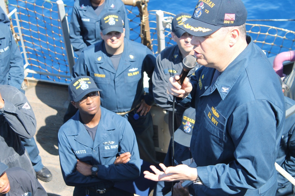 Commodore visits ships at sea