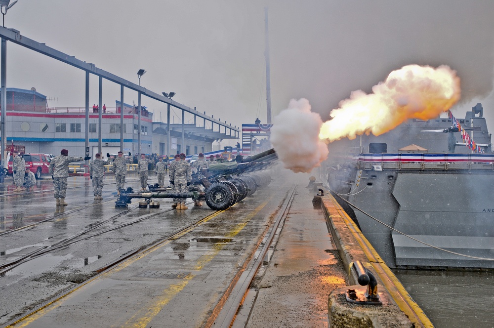 Airborne artillerymen salute USS Anchorage