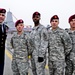 Airborne artillerymen salute USS Anchorage