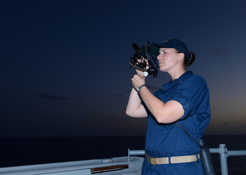 USS Carter Hall sailor navigates