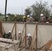 US, Chilean, Colombian and Salvadoran engineers work together to build schoolhouse