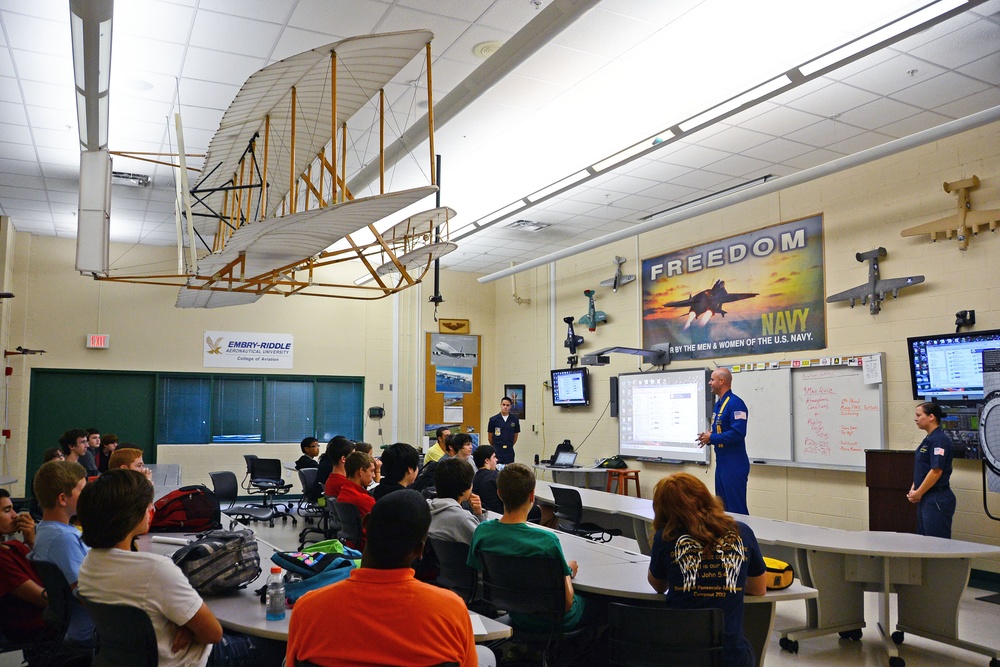 Members of Navy Flight Demonstration Squadron talk to aviation students