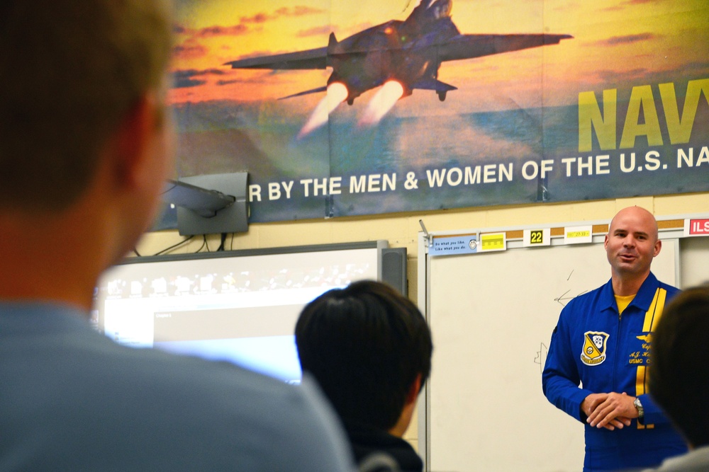 Members of Navy Flight Demonstration Squadron talk to aviation students