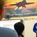 Members of Navy Flight Demonstration Squadron talk to aviation students