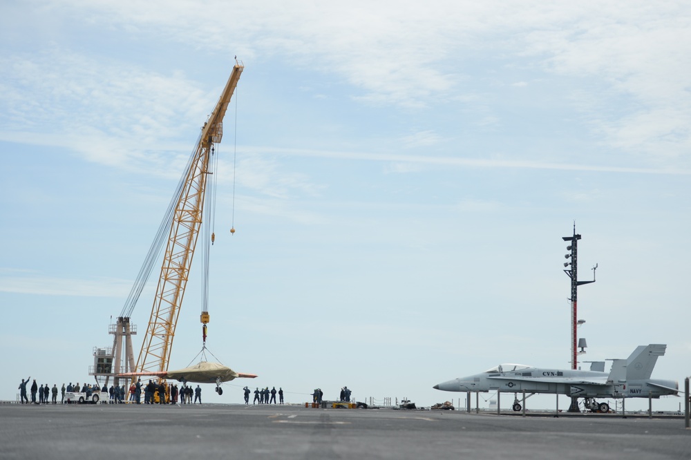 X-47B UCAS demonstrator loaded on USS George H.W. Bush