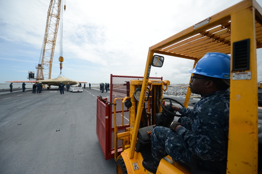 X-47B UCAS demonstrator loaded on USS George H.W. Bush