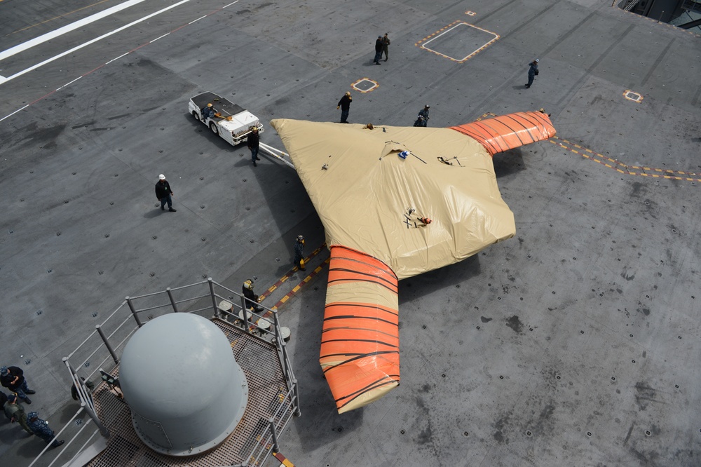 X-47B UCAS demonstrator loaded on USS George H.W. Bush