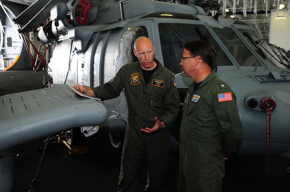 CSG 1 commander tours USS Carl Vinson