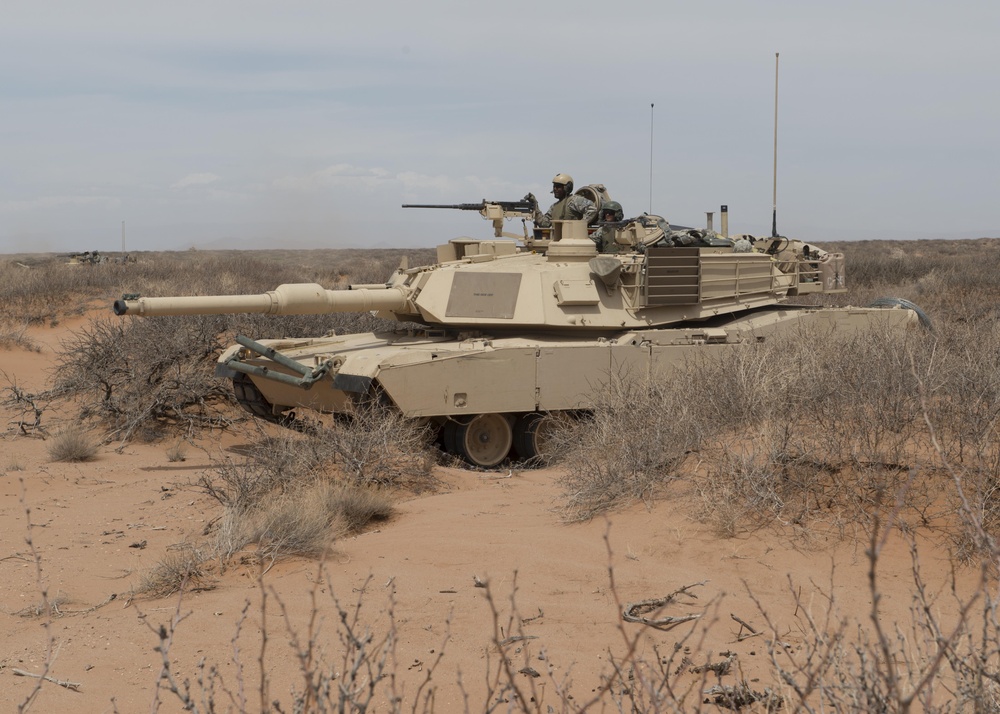 an M1 Abrams with 1-6 Inf provides security during NIE 13.2