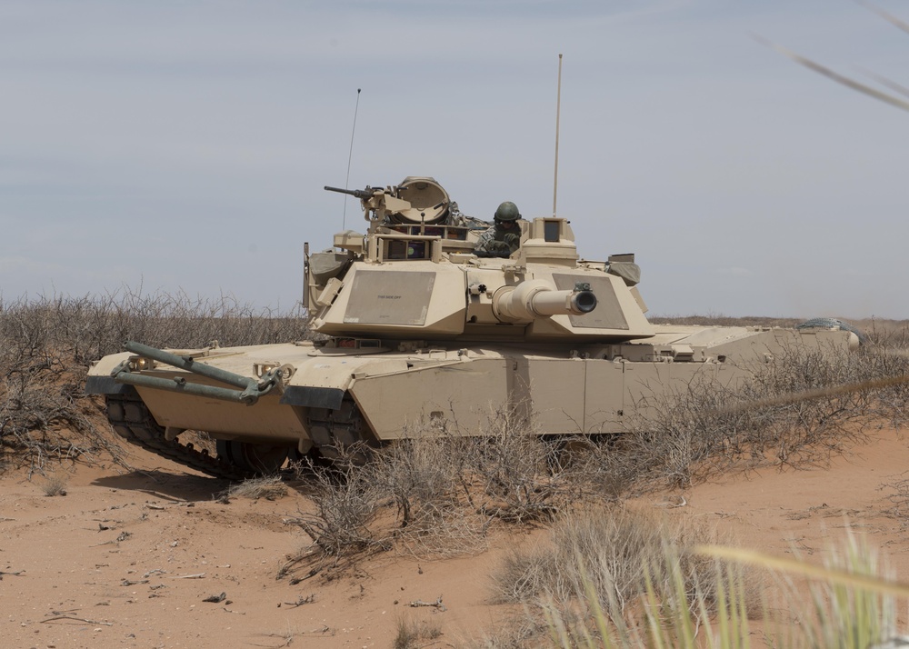 an M1 Abrams with 1-6 Inf provides security during NIE 13.2 at Dona Ana N.M.