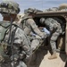 Soldiers with 1-6 Inf simulate evacuating injured refugees during NIE 13.2 near Dona Ana N.M.