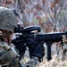 U.S. Marines conduct live-fire over rough terrain