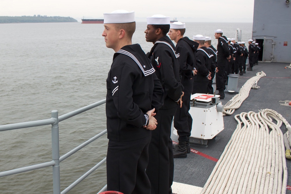 USS Lake Champlain sailors man the rails