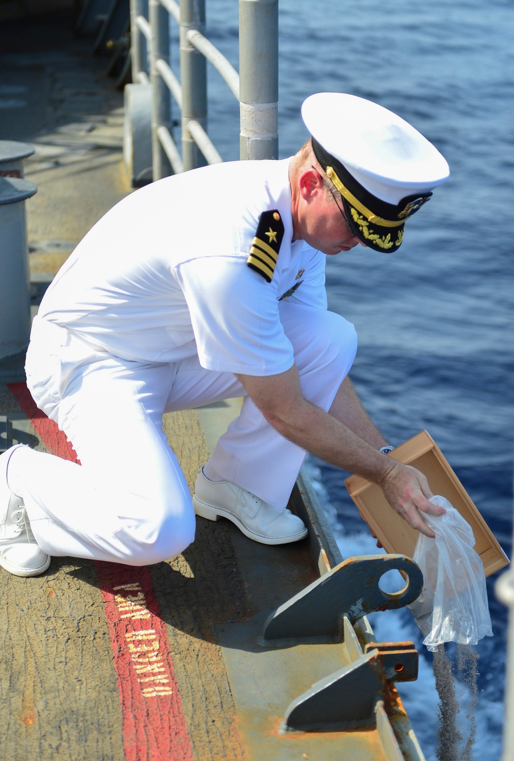 USS Monterey sailors conduct burial at sea