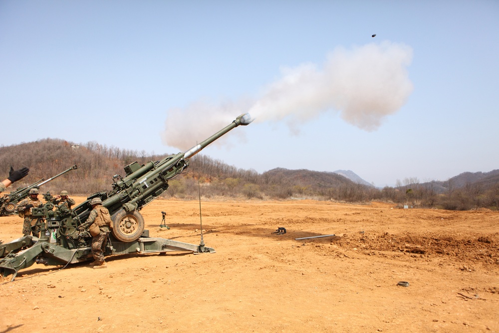 U.S. Marines fire artillery in support of combined arms exercise