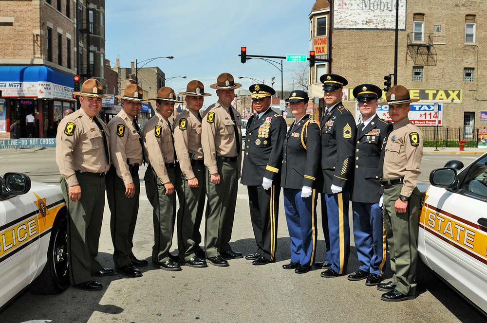 Illinois State Troopers and 85th Support Command Soldiers pose before the Chicago &quot;Cinco de Mayo&quot; parade