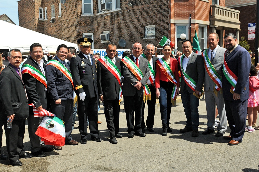 Brig. Gen. Gracus Dunn poses with Chicago Hispanic community leaders