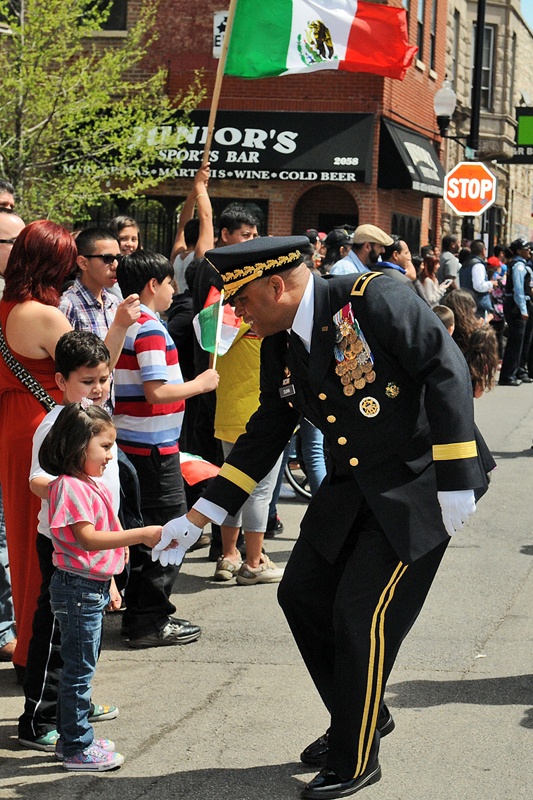 Brig. Gen. Gracus K. Dunn greets young spectators