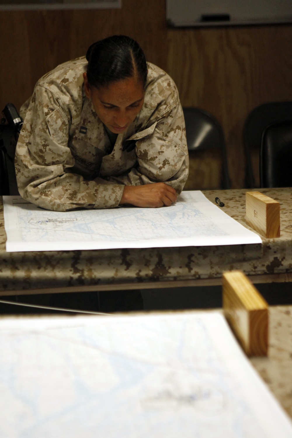 U.S. Navy Sailors work towards their Fleet Marine Force badge with the help of U.S. Marines