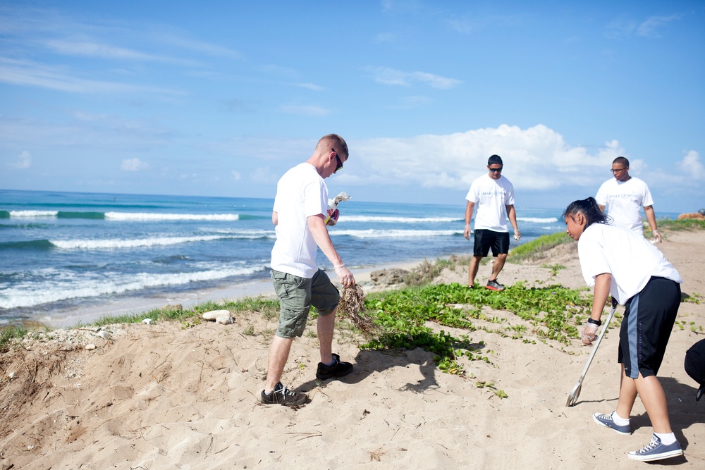 Picking up trash for cash: Marines help raise money by cleaning beach