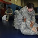 Medic and mechanic spar in Army Combatives