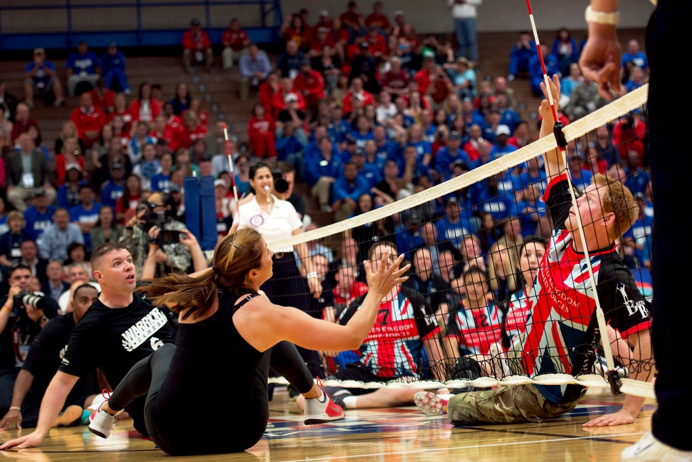 Prince Harry plays sitting volleyball with wounded warriors, Misty May-Treanor