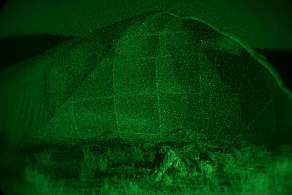 Paratroopers conduct nighttime airborne operations