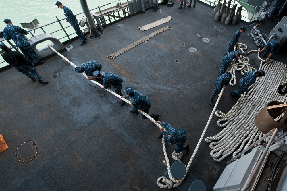 Nimitz sailors heave a line