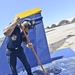 Blue Angels crew chief washes aircraft