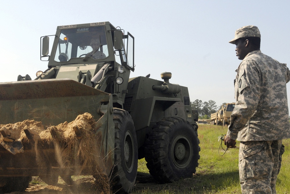 The 'Groundbreakers' clear heavy debris from the road in support of Ardent Sentry