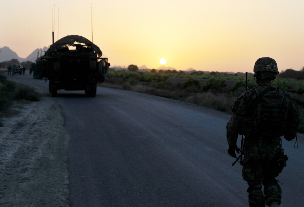 Soldiers conduct traffic checkpoint