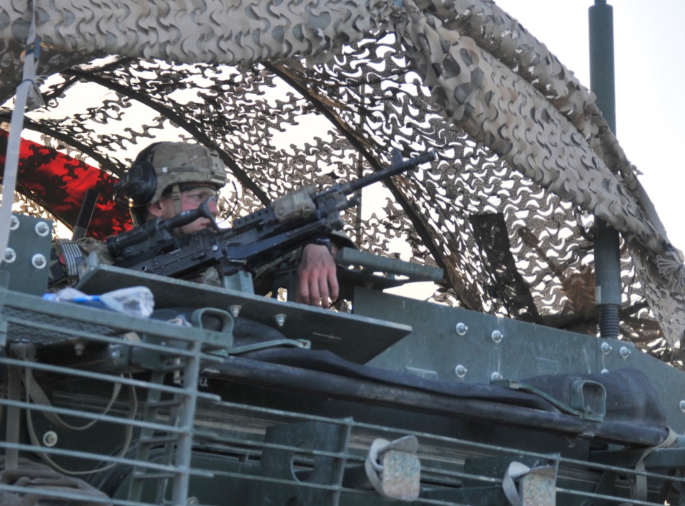 Soldiers conduct traffic checkpoint