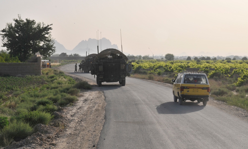 Soldiers conduct traffic checkpoint