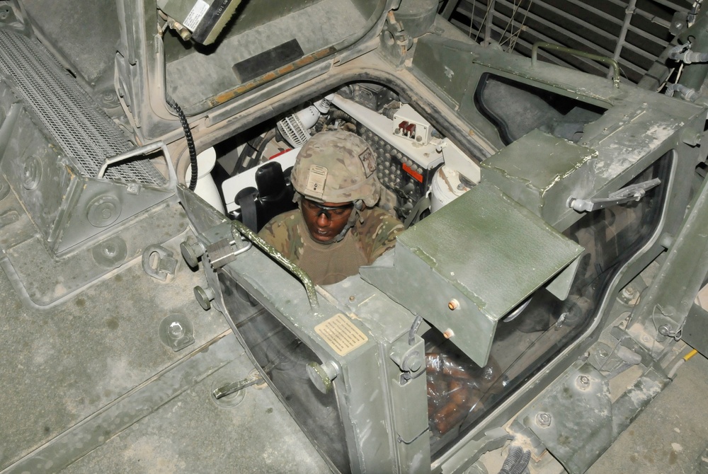 Soldiers conduct traffic checkpoint