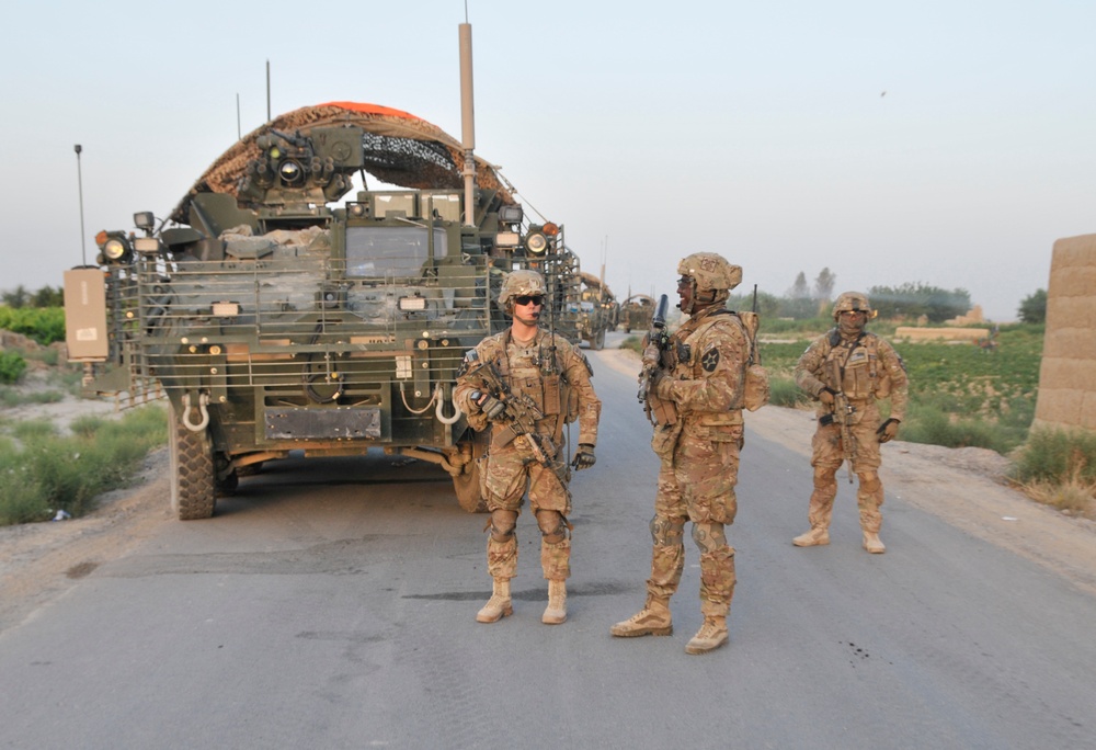 Soldiers conduct traffic checkpoint