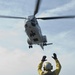 Helicopter delivers cargo aboard USS San Antonio