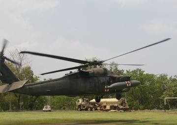 The medevac UH-60 Black Hawk helicopter lifts off for a casualty retrieval exercise