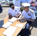 Rear Adm. Dan Abel and Col. Aaron Gross sign the North American Safe Boating Campaign Proclamation