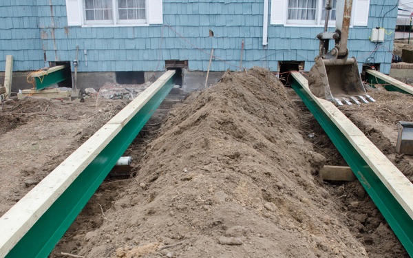 Historic home in Freeport, NY, is elevated to reduce risks from future floodingHistoric home in Freeport, NY, is elevated to reduce risks from future flooding