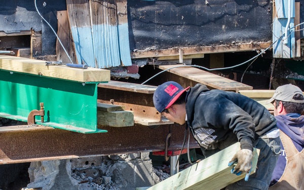 Historic home in Freeport, NY, is elevated to reduce risks from future flooding