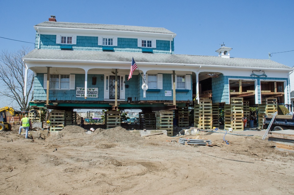 Historic home in Freeport, NY, is elevated to reduce risks from future flooding
