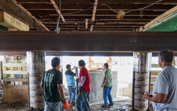 Historic home in Freeport, NY, is elevated to reduce risks from future flooding
