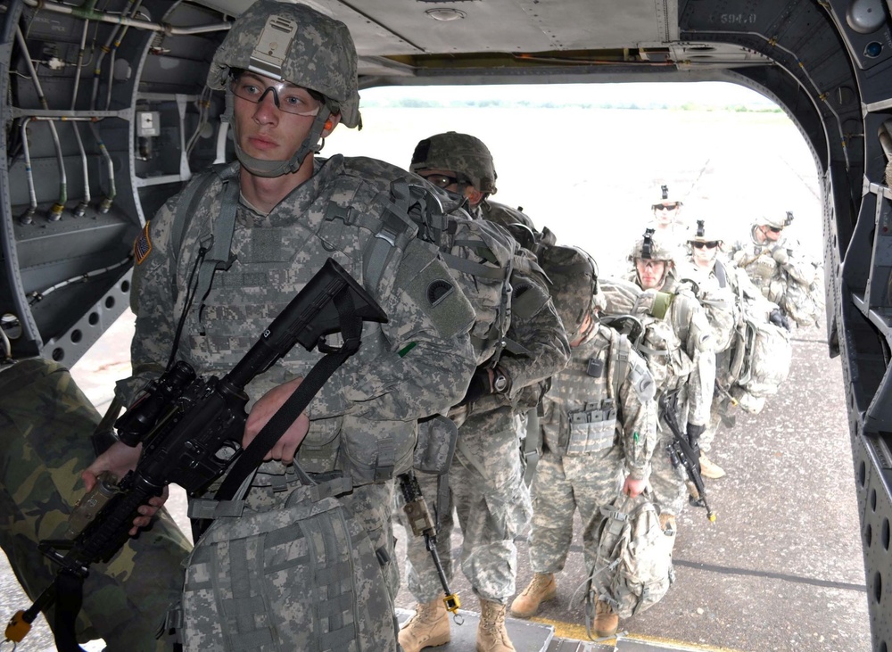 Infantry soldiers board CH-47 helicopter