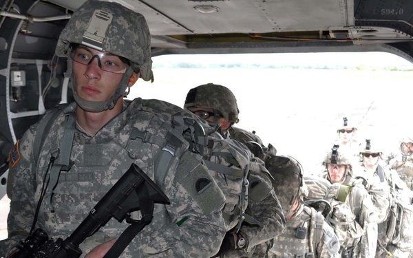 Infantry soldiers board CH-47 helicopter