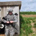 Soldier prepares M81 detonator for cratering charge demolition