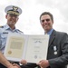 Presentation the Silver Lifesaving Medal citation to George Chait.