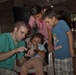 U.S. Army Cadet Matthew Lisle interacts with local children in Metalio, El Salavador