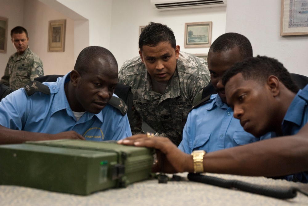 Tradewinds 2013 Participants tune in during Radio Operations Training