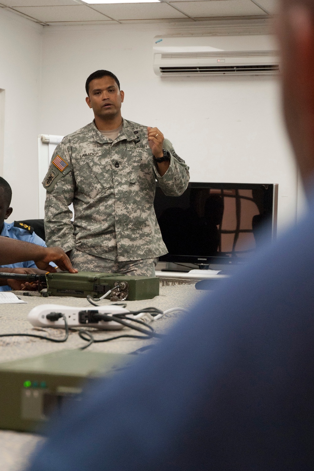 Tradewinds 2013 Participants tune in during Radio Operations Training