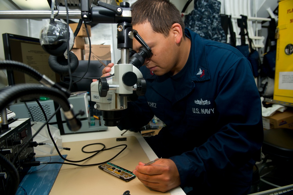 USS William P. Lawrence sailor at work